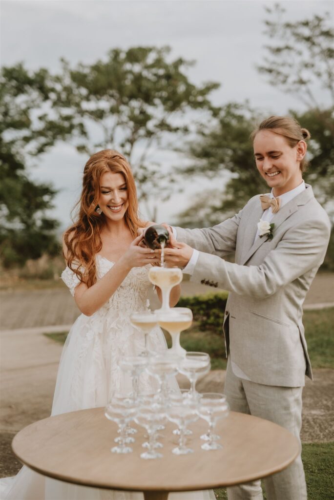 bride and groom toasting their love