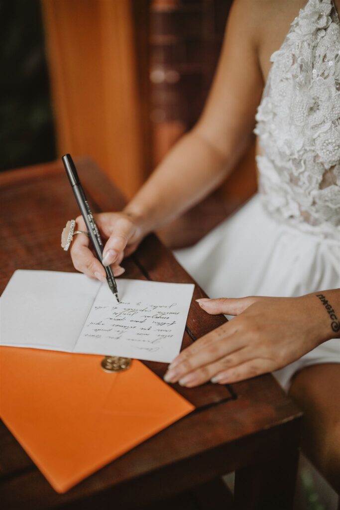 The bride preparing her vows for her wedding Andaz, Costa Rica